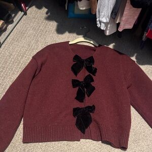 Elegant Burgundy Sweater with Black Bow Accents
